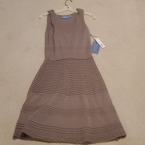 Brand new, sleeveless, lined, taupe colored dress.